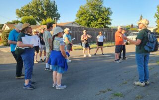 Group gathering for walk along the Santa Rosa Southeast Greenway property