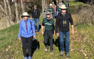 Group being led by Southeast Greenway volunteer along properly