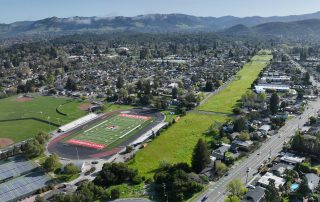 Drone photo over Montgomery High School with Southeast Greenway adjacent
